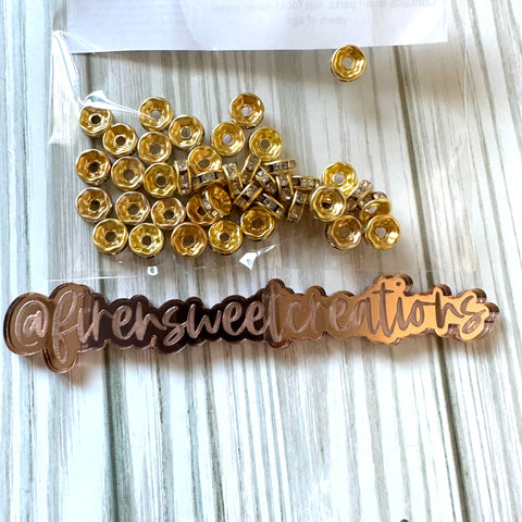 Gold with clear stone spacers 8mm